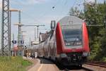 Am Ende der RE1 (10125) aus Aachen nach Hamm mit Zuglok 146 025-2 h�ngt, mal wieder, ein Steuerwagen der Bauart 763.6, hier beim Halt in Stolberg (Rheinl.) Hbf, 13.6.10