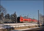 RE7 (RE 29719)  Rhein-M�NSTERLAND-Express  ist bei Westhofen nach Krefeld unterwegs.