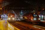 DB 111 118 mit RE9 und Thalys 4332 in K�ln Hbf, Januar 2023.
