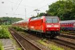 DB 146 002 mit RE9 in Köln West, Juni 2022.