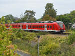 Der DB-Elektrotriebzug 1440 724 ist hier als RB33 nach Essen-Steele unterwegs. (Rheinhausen, August 2022)