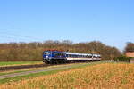 Deutschland 
Lok 111 054 von TRI zieht einem Personenzug RB37 Krefeld - Neuss, in Bösinghoven 
3/3/2026