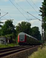 Steuerwagen voraus kommt hier ein RE5 Zug aus Emmerich nach Koblenz gefahren hier ist er hinter Haldern nach Mehrhoog unterwegs.8.6.2014