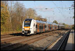 RRX 462072 passiert hier auf der langen Fahrt als RE 6 zum Flughafen Köln Bonn am 3.11.2020 um 10.50 Uhr den Haltepunkt Hiddenhausen Schweicheln.