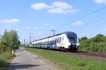 Triebwagen 854 (Nationalexpress) zusammen mit einem weiteren Triebwagen als RE7 in Richtung Rheine in Kaarst, 14.