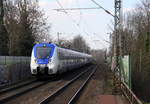 Der RE7 aus Krefeld-Hbf nach Rheine und kommt aus Richtung Neuss-Hbf und fährt durch Neuss-Süd in Richtung Neuss,Norf,Neuss-Allerheiligen,Nievenheim,Dormagen,Köln.