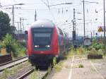Der RE11  Rhein-Hellweg-Express  wird von einer 112 in den Bahnhof von Hamm(Westf) geschoben. 30.06.08