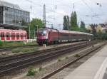 1116 226 schiebt am 24. Juni 2011 einen Railjet nach Budapest Keleti p�lyaudvar durch M�nchen-Heimeranplatz.