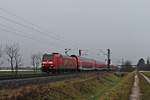 Mit einer RB (Offenburg - Neuenburg (Baden)) fuhr am 20.12.2017 die Freiburger 146 114-4  Baden Württemberg erfahren/Landkreis Emmendingen  bei Hügelheim in Richtung Müllheim (Baden),