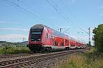 Als RB (Basel Bad Bf - Freiburg (Brsg) Hbf) fuhr am Nachmittag des 08.07.2020 der Freiburger D-DB 50 80 86-35 063-6 (Bauart: DBpbzfa 765) zusammen mit der 146 214-2 nördlich von Hügelheim in