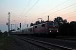 Am frhen Morgen des 11.07.2013 fuhr 111 050-1 als RB 26547 (Offenburg - Basel Bad Bf) in den Bahnhof von Orschweier ein.