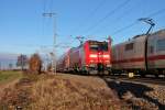 Begegnung von 146 114-4  Baden-Württemberg erfahren  und einem ICE 1, am 07.12.2013 bei der nördlichen Ein-/Ausfahrtgruppe in Müllheim (Baden).