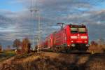 Im Herbstlichen Abendlicht des 07.12.2013 fuhr 146 116-9  Baden-Württemberg erfahren  mit ihrem RE nach Basel dem nächsten Halt in Müllheim (Baden) entgegen.