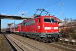 Einfahrt von der Freiburger 111 054 am 20.02.2014 mit RB 26566 (Neuenburg (Baden) - Offenburg) in den Bahnhof von Orschweier.