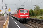 Ausfahrt am 25.04.2014 von der Freiburger 111 061 mit einer RB aus Offenburg nach Schliengen in Müllheim (Baden).