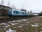 223 066 mit dem ALEX ALX 37987 von Hof Hbf nach Mnchen Hbf kurz nach Wiesau (Oberpf), 01.03.2009