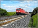 143-052 mit einer RB in der Nhe von Crailsheim.(30.05.2009)