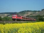 111 223 ist am 23.04.11 mit dem RE 4608 nach Frankfurt(M) bei Himmelstadt unterwegs.