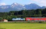 DB 111 066-7 mit Werbung   Mit dem Bayern-Ticket zu den schnsten Biergrten   vor RE 79031 Mnchen - Freilassing, KBS 951 Mnchen - Rosenheim - Salzburg, fotografiert bei bersee am 14.05.2012