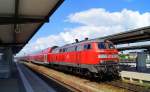 218 454-7 steht am 31.05.2014 mit der RB 27048 nach München Hbf Gl.5-10 in Mühldorf (Oberbay) auf Gleis 4 zur Abfahrt bereit.