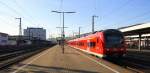 440 813-4 DB ein RE von Würzburg-Hbf nach Nürnberg-Hbf bei der Ausfahrt vom Würzburger-Hbf und fährt in Richtung Nürnberg.