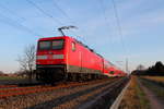 Die 112 107 mit dem RE 4365 auf der RE 5 von Rostock Hbf nach Wünsdorf-Waldstadt  am 28.03.2017 in Nassenheide.