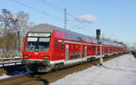 DB Regio, RB10 (18520) Steuerwagen mit Fahrtziel Nauen, hier während der Einfahrt in den Bahnhof von Berlin Jungfernheide, im Februar 2021.