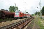 RE 38558 mit 143 254-1 am 23.06.2008 im Bahnhof Kerkwitz