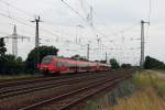 442 122 mit 442 631 als RB 22(RB 28819) von  Berlin Schnefeld Flughafen am 24 Juni  2012 nach Potsdam Hauptbahnhof  bei der Einfahrt in den Bahnhof Saarmund.