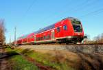 Der RE 4356 von Rostock Hbf nach Lutherstadt Wittenberg am 25.11.2013 in Nassenheide.