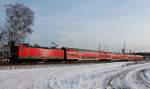 Die 112 112 auf der RE 5 als RE 18512 von Falkenberg (Elster) nach Stralsund Hbf am 23.01.2014 in Nassenheide.