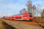 Unbekannt gebliebene 112-er zieht den RE 5 am 03.12.2015 von Lutherstadt Wittenberg nach Rostock Hbf durch Nassenheide.