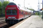 Ein ex.DR-Doppelstocksteuerwagen mit dem RE3 von Dessau kommend in Berlin-Wannsee.