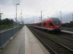 Hier 429 029-2 als RE9 vom Ostseebad Binz nach Rostock Hbf., bei der Ausfahrt am 19.6.2010 aus Bergen auf Rgen.