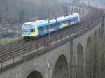 RB 72 Flirt  Ostwestfalenbahn  von Paderborn Hbf. nach Herford auf dem Altenbekener Viadukt erreicht in Krze Altenbeken Bahnhof.(20.04.2008) 