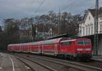 RE4870 nach Aachen mit Schublok 111 156 am Heck bei der Ausfahrt in Eschweiler Hbf 21.2.10