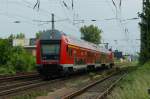 RE nach Leipzig gezogen von 114 301-5 kurz hinter Dessau Hbf am 22.05.2009