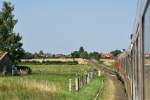 218 453-9 mit einer RB nach Flensburg am 7.08.2009 kurz vor dem Erreichen des Haltepunkts Rieseby.