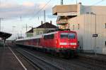 Einfahrt am 04.03.2015 von der Freiburger 111 048-5 mit der RB 26578 (Basel Bad Bf - Offenburg) und +10min Verspätung in den Bahnhof von Müllheim (Baden).