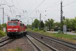 Einfahrt am 18.04.2014 von der Freiburger 111 060-0  1000 Jahre Gundelfingen  mit einer RB (Offenburg - Neuenburg (Baden)) in Müllheim (Baden).