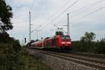 Einfahrt am 10.08.2014 von der Freiburger 146 236-5  Schwarzwaldbahn Erlebnispfard  mit einem RE (Schliengen - Offenburg) in den Bahnhof von Müllheim (Baden).