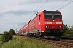 146 111-0  Baden Württemberg erfahren  am 12.05.2015 mit einem RE (Offenburg - Basel Bad Bf) bei Hügelheim, als sie ihrem nächsten Zwischenstop in Müllheim (Baden) entgegen fuhr.