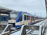 VT 499 der BRB steht in München Hbf mit der RB 57 nach nach Tegernsee und drei weiteren Schwestertriebzügen, 12.01.2026.