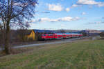 111 092 DB Regio mit RE 4858 (München Hbf - Nürnberg Hbf) bei Pölling, 19.02.2022