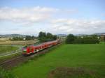 Eine Regionalbahn nach Naumburg (Saale) Hbf ist am 14. August 2010 auf der Frankenwaldbahn bei Oberlangenstadt unterwegs.