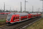 445 003-0+Mittelwagen+445 007-1 als Personalschulungsfahrt bei der Einfahrt im Rostocker Hbf.20.10.2017