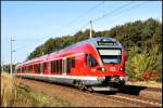 Ein 429er als RE 33209 Rostock-Sassnitz am 06.10.2009 bei der Ausfahrt aus dem Bahnhof Martensdorf.