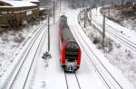 Eine Dosto-Garnitur aus Halle(S) erreicht am 02.01.2010 Bitterfeld.