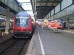 Zwei RE`s in Stuttgart Hbf.
Links RE nach Mosbach-Neckarelz und rechts IRE nach Karslruhe Hbf. 
