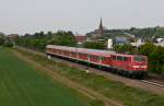 111 048-5 mit RB 26567 (Offenburg - Neuenburg (Baden)) am 7. Mai 2011 bei Teningen.